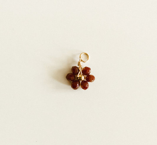 Small burgundy bead flower