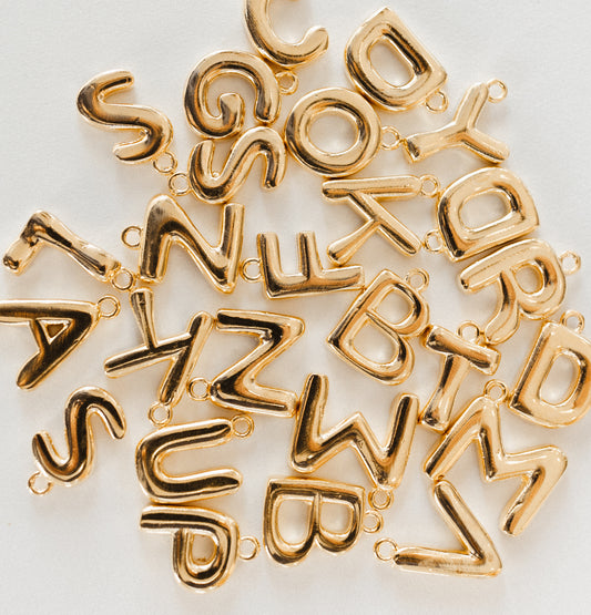 Large gold bubble letters A-Z