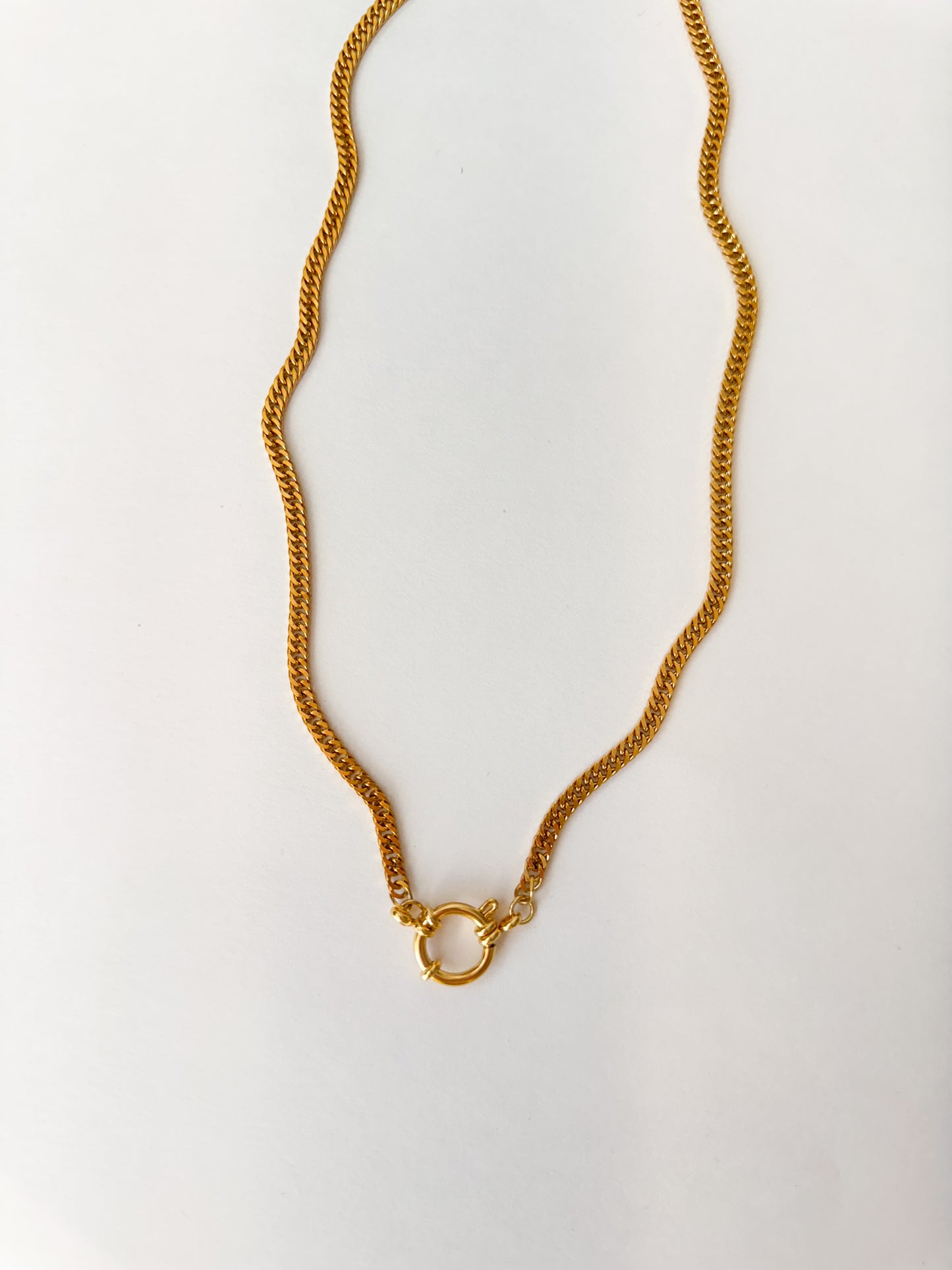 Gold figaro charm clip necklace