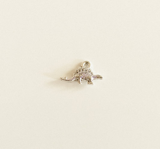 Tiny silver Dino