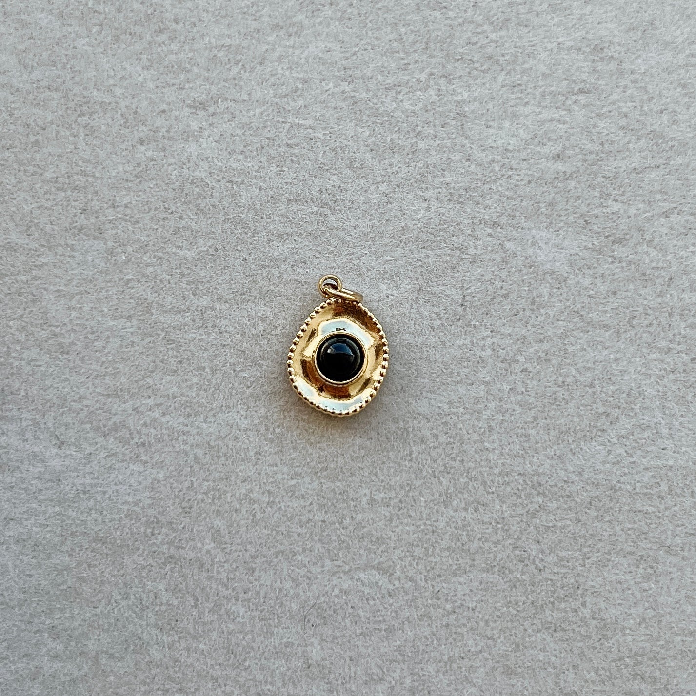 Small gold black gem circle