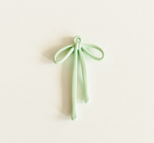 Large green droopy bow