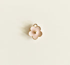 Small gold pink flower