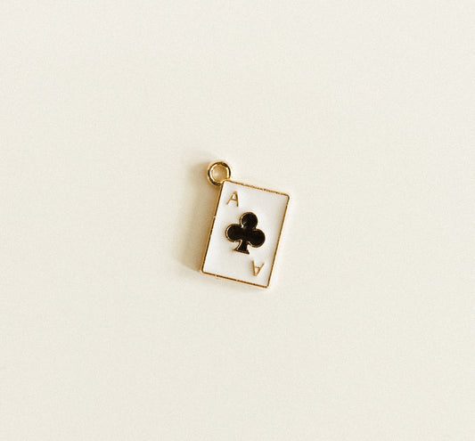 Small gold black ace of clubs card