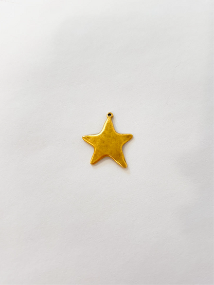 Small flat gold ribbed star