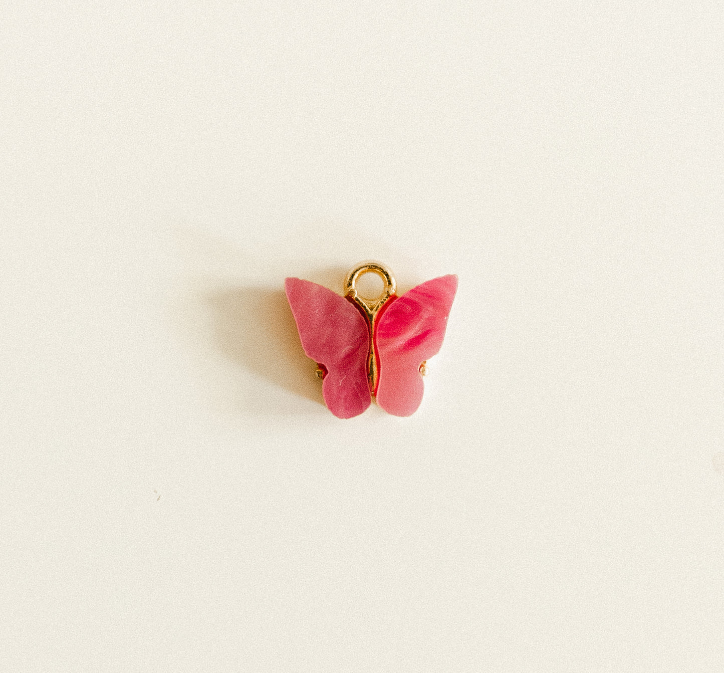 Gold dark pink gem butterfly