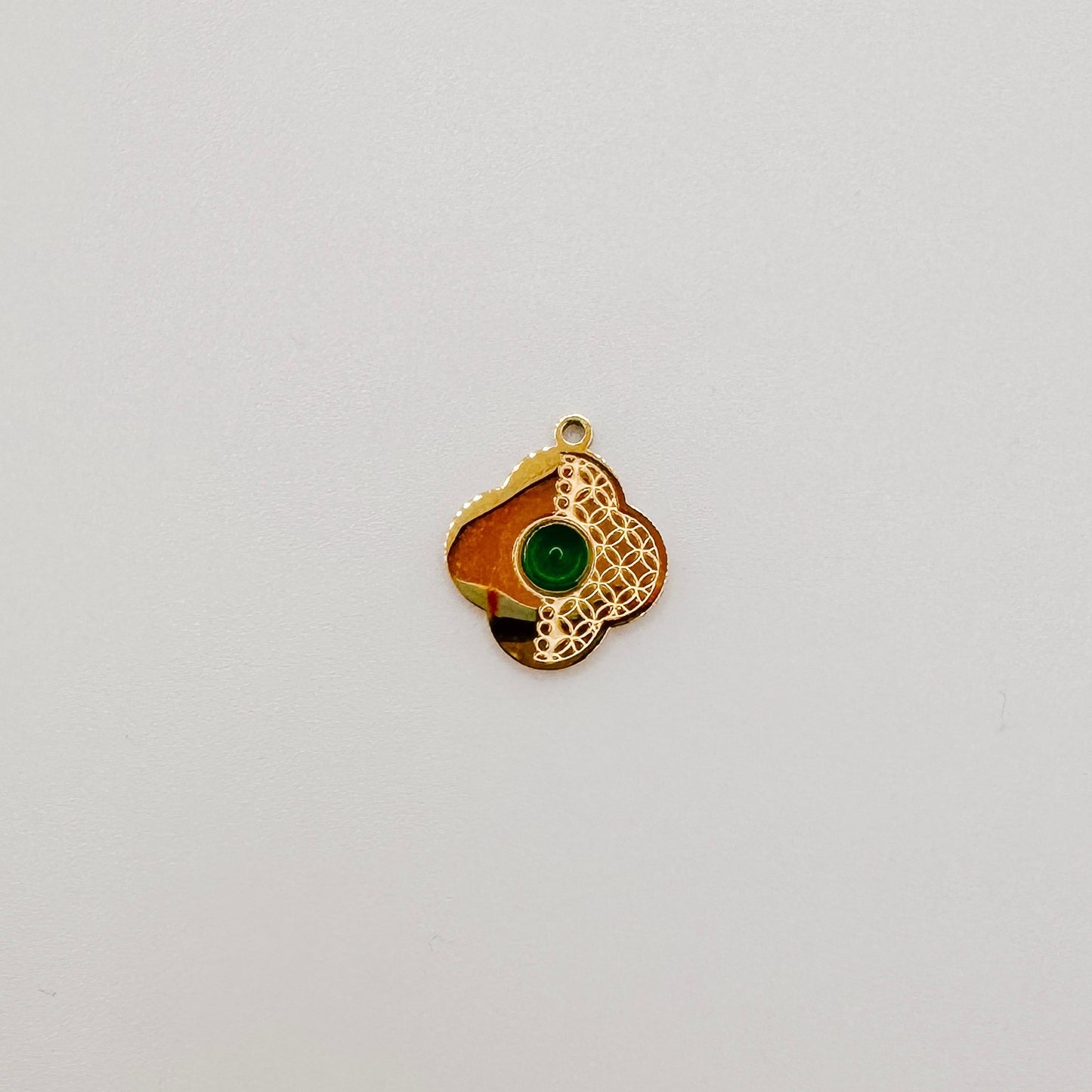 Gold clover with green gem