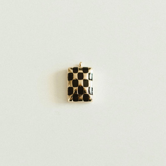 Small black & gold checkered rectangle