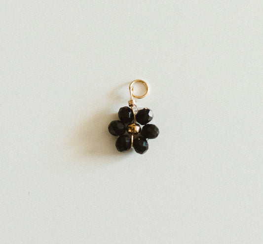 Small gold black bead flower