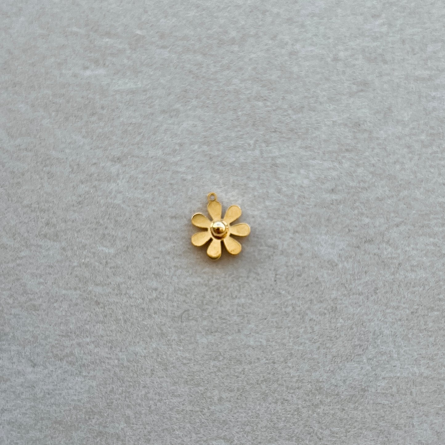 Tiny gold flower