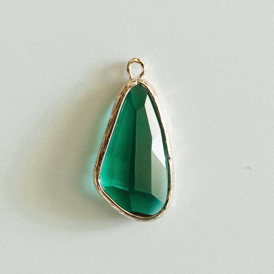 Large gold green gem