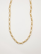 Gold mini oval and knot necklace