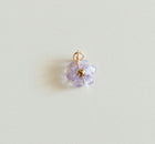 Small gold light purple bead flower