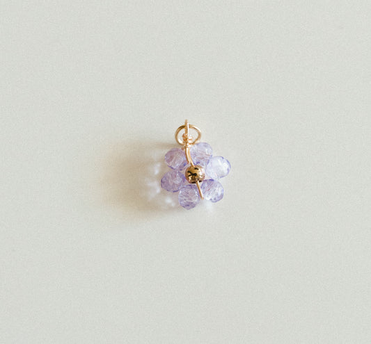 Small gold light purple bead flower