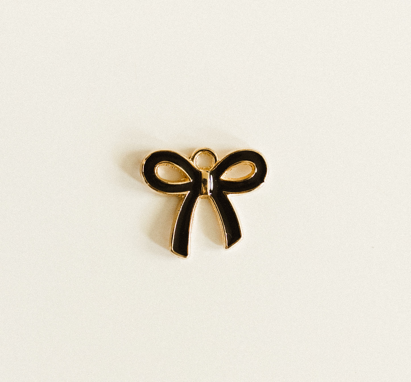 Gold black bow