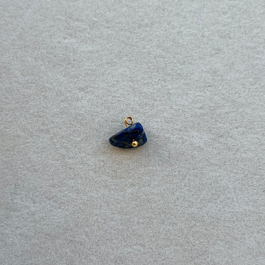 Tiny gold dark blue gem