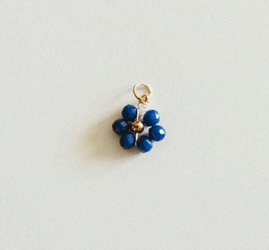 Small gold blue bead flower