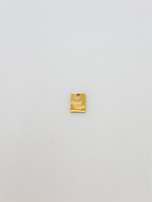 Tiny gold square good luck