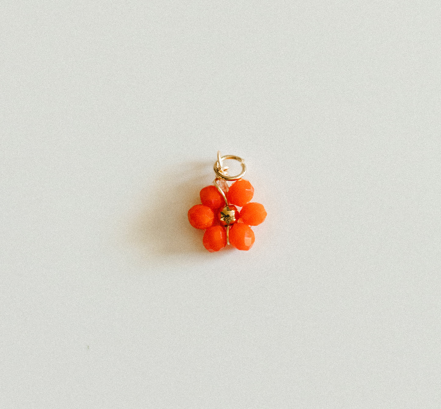 Small gold orange bead flower