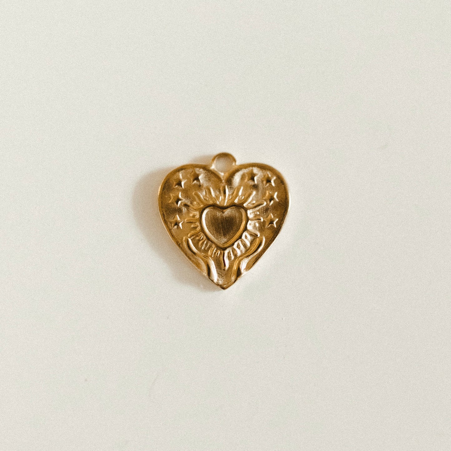 Gold heart with designs