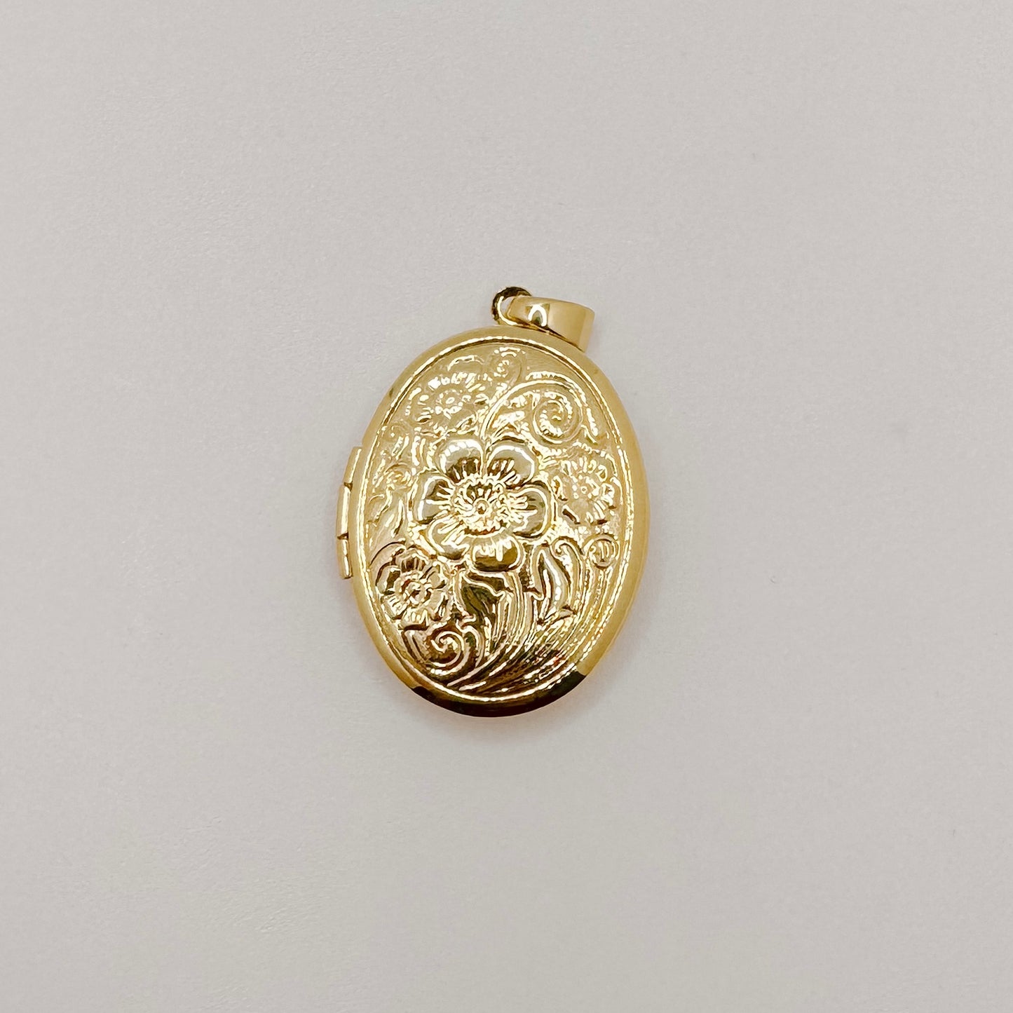 Large gold flower locket