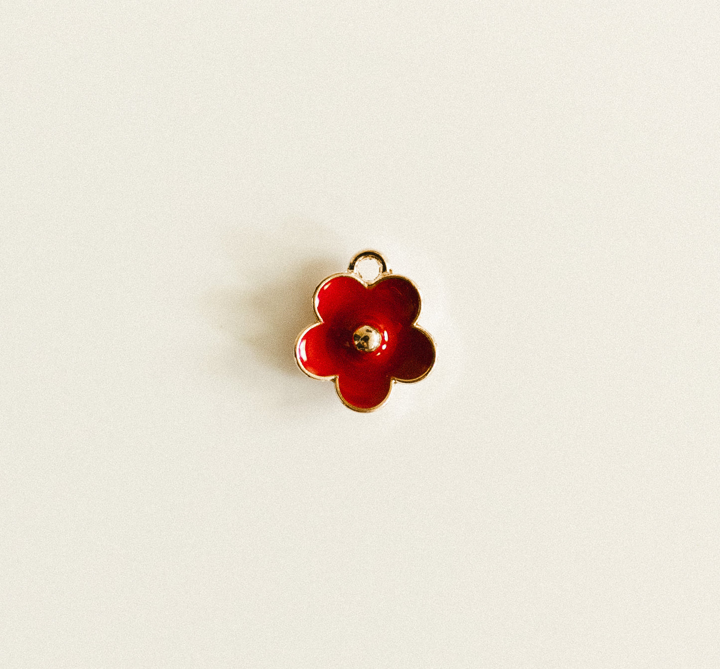 Small gold red flower