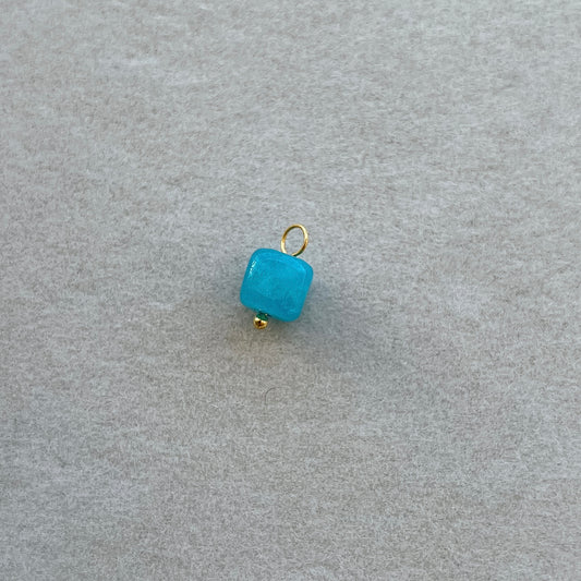 Small gold blue gem