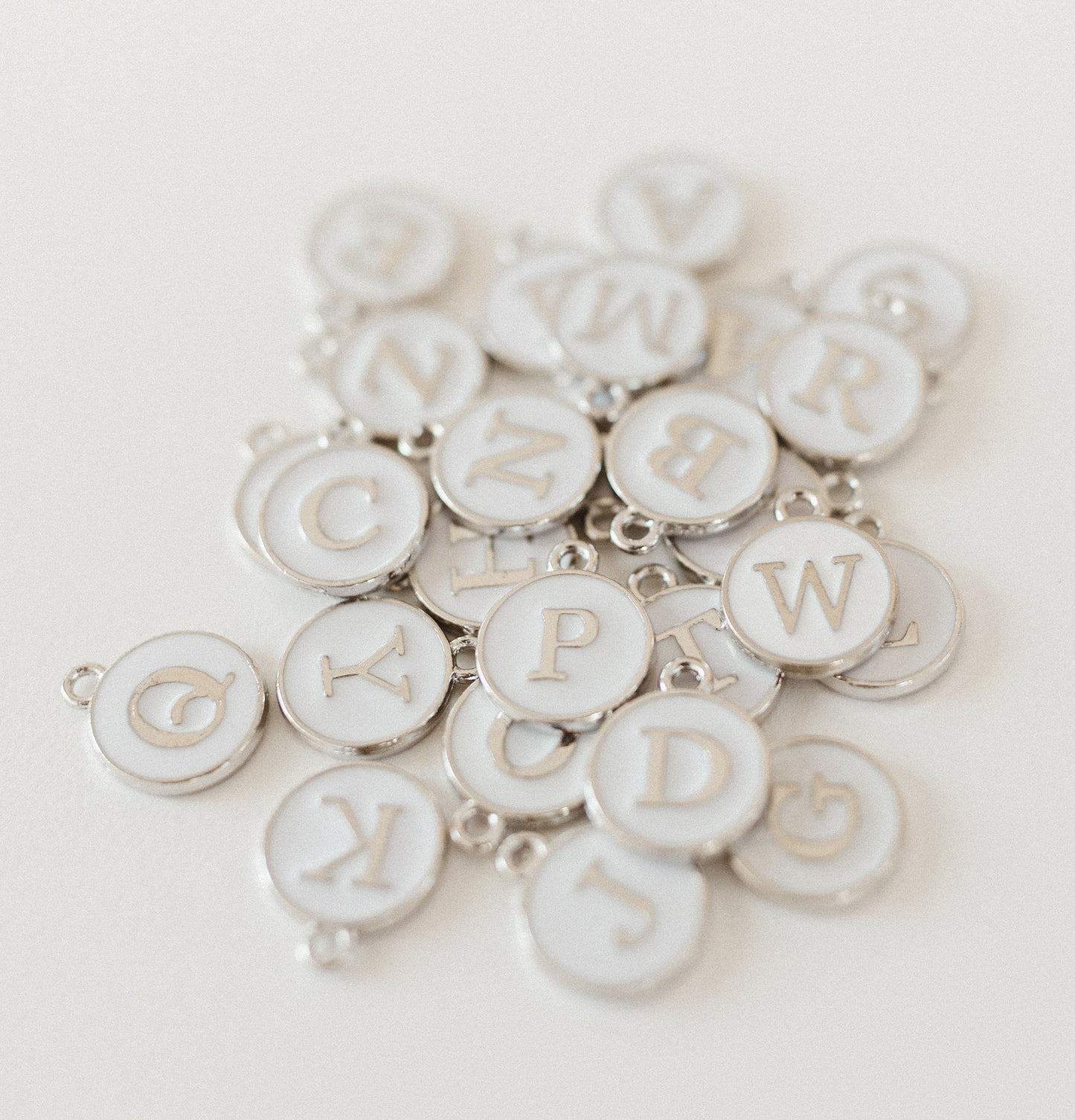 Silver white circle letters A-Z