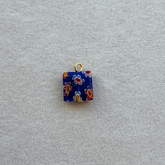 Gold square dark blue glass bead