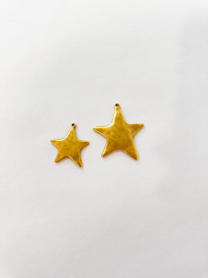 Small flat gold ribbed star
