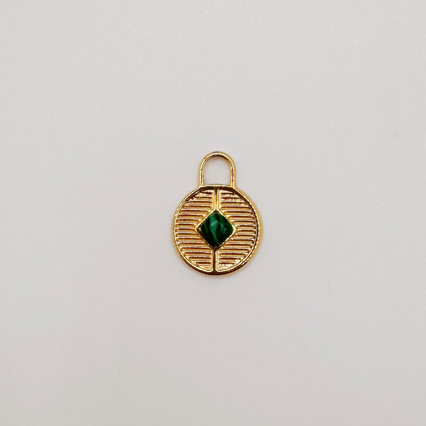 Gold green lock charm