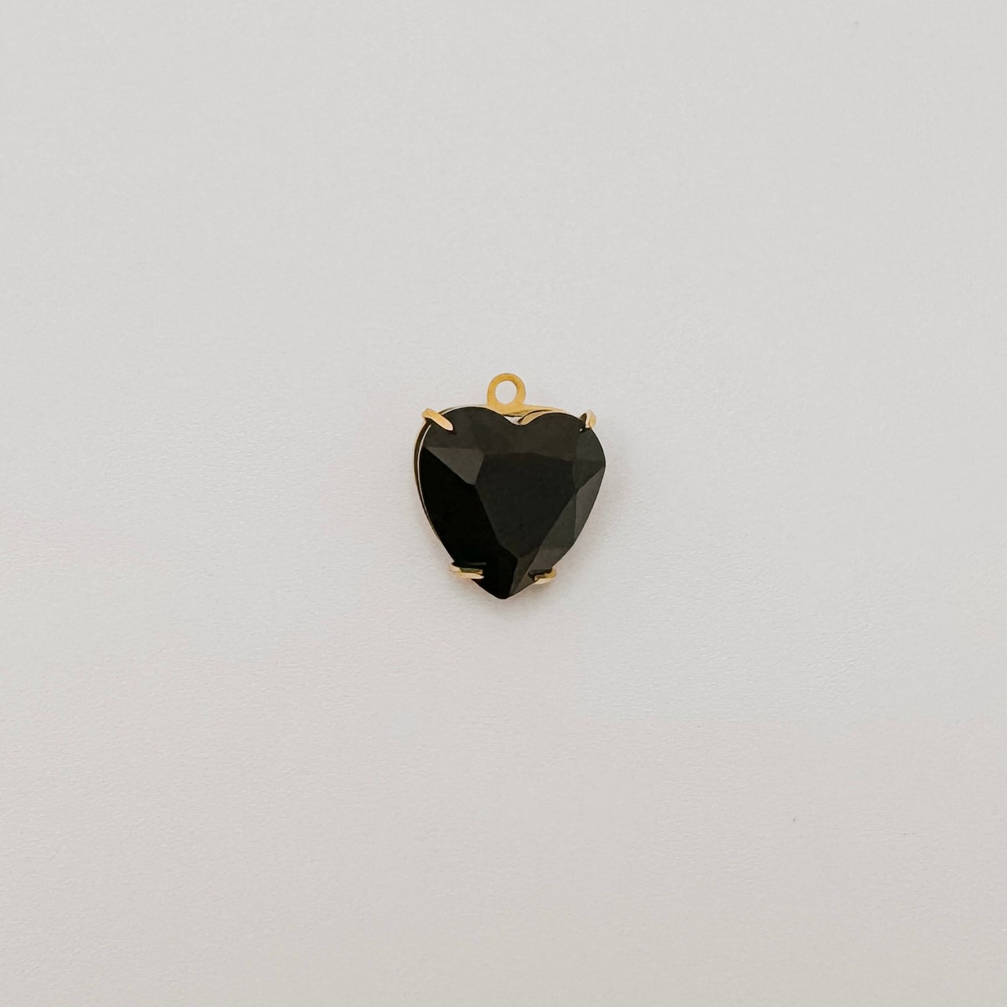 Gold black gem heart