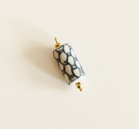 Gold blue & white ceramic charm