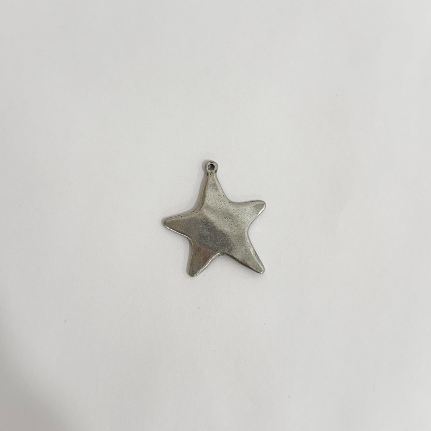 Antique silver medium star