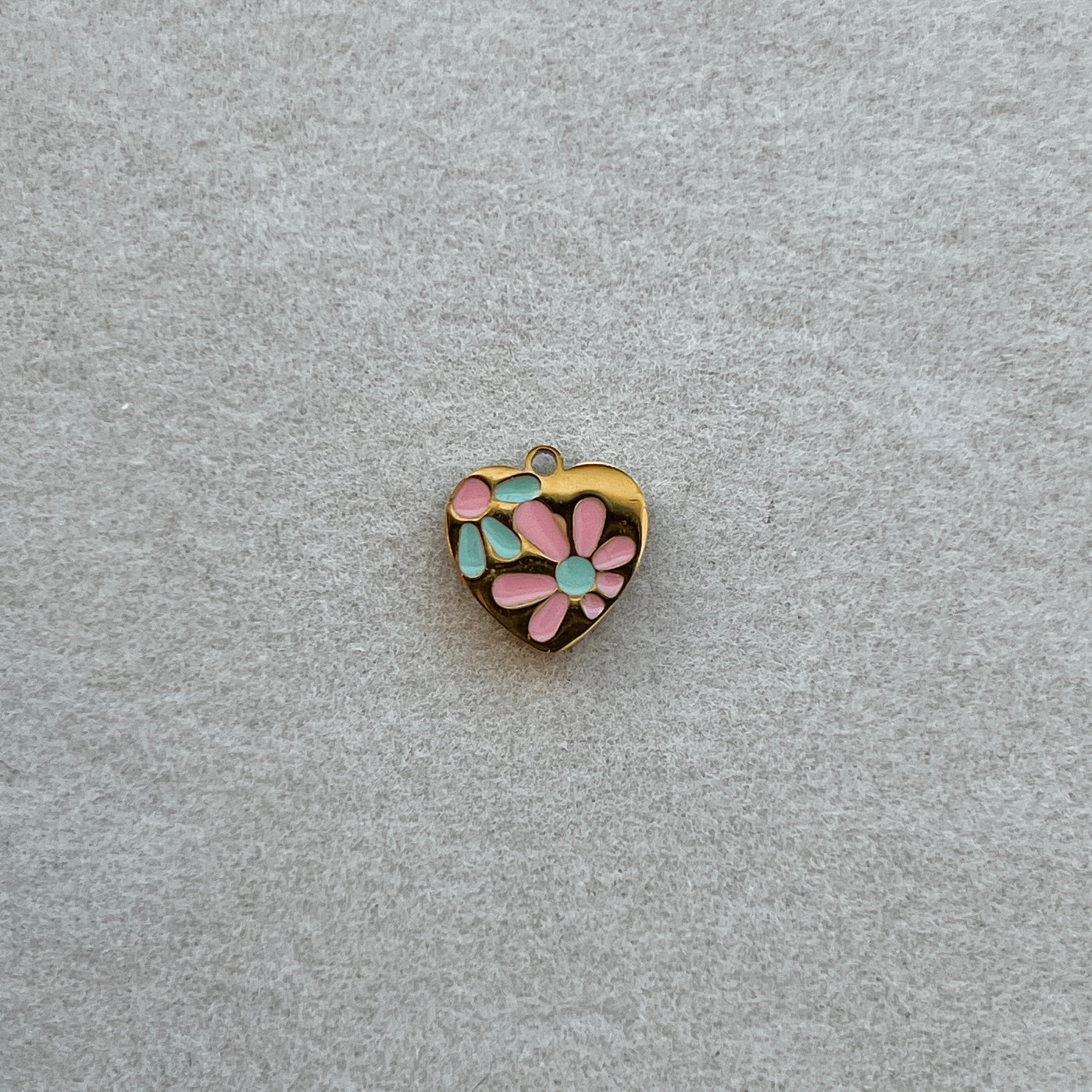 Tiny gold heart with flowers