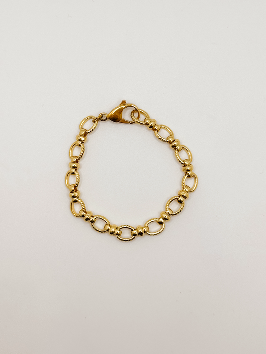 Chunky gold oval & knot bracelet