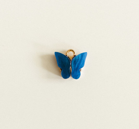 Gold dark blue gem butterfly